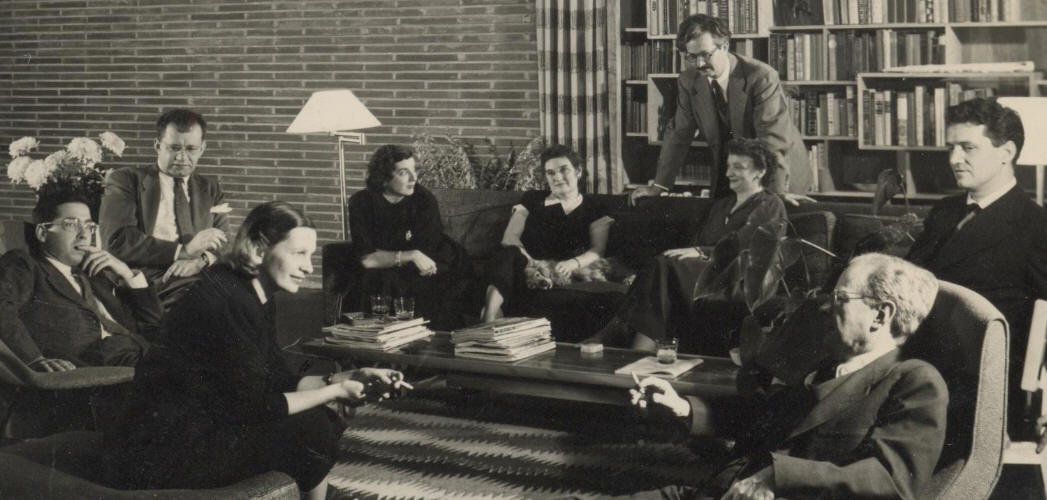 NCSU Faculty Cecil Elliott, Dean Joseph Hudnut of the Harvard School of Architecture, Siasia Nowicki, House & Garden Architectural Editor Katherine Morrow Ford, unknown, Henry Kamphoefner, NCSU Faculty Margaret Fitzgibbon, New York architect Abraham (Abe) Geller, and NCSU Faculty Jim Fitzgibbon. Credit: André Kertész.