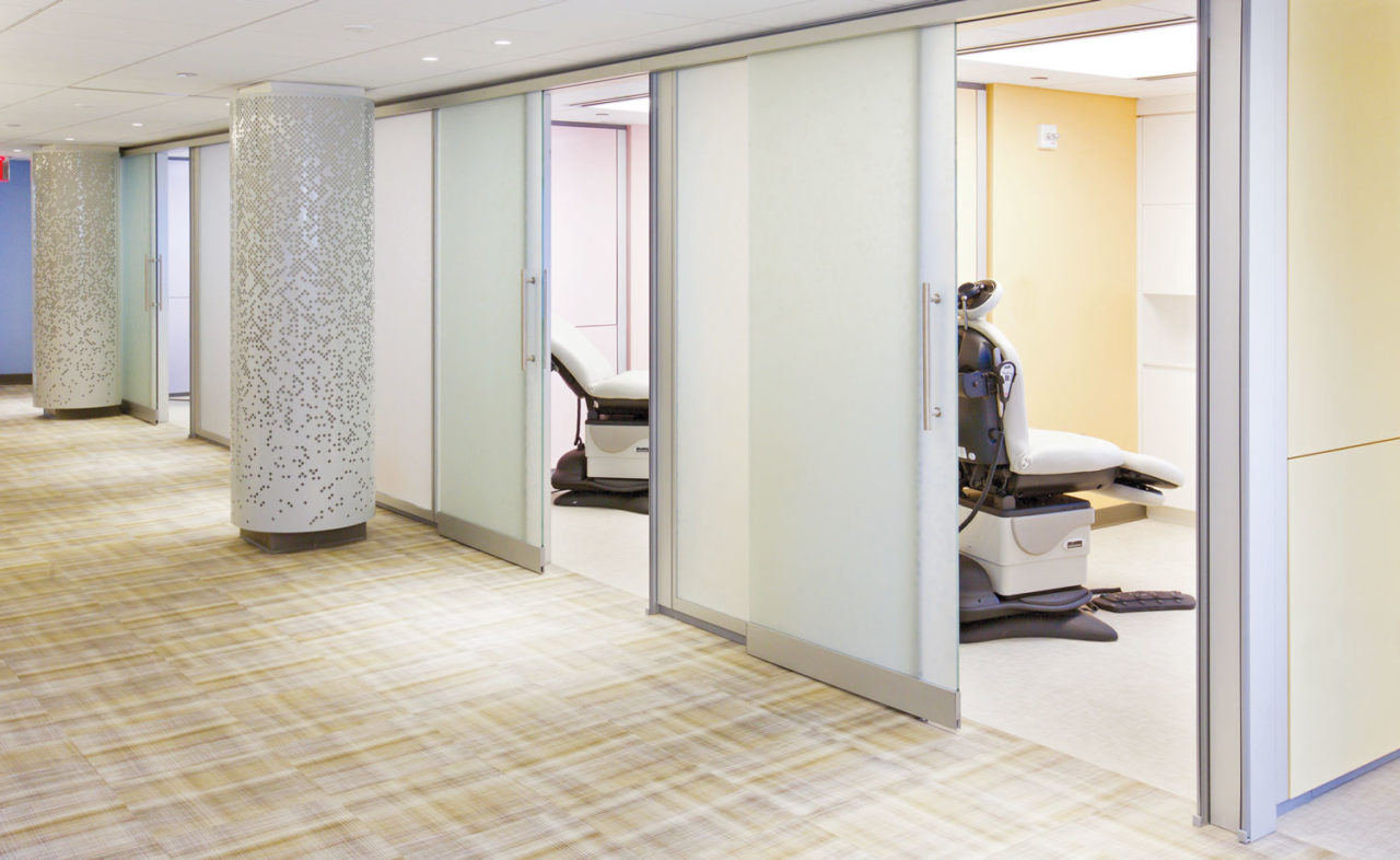 Kliment Halsband's plastic surgery exam rooms at Mt. Sinai offer patients privacy, while calming pastels and frosted windows provide a lightness to the space. Photo: Monica Graff.