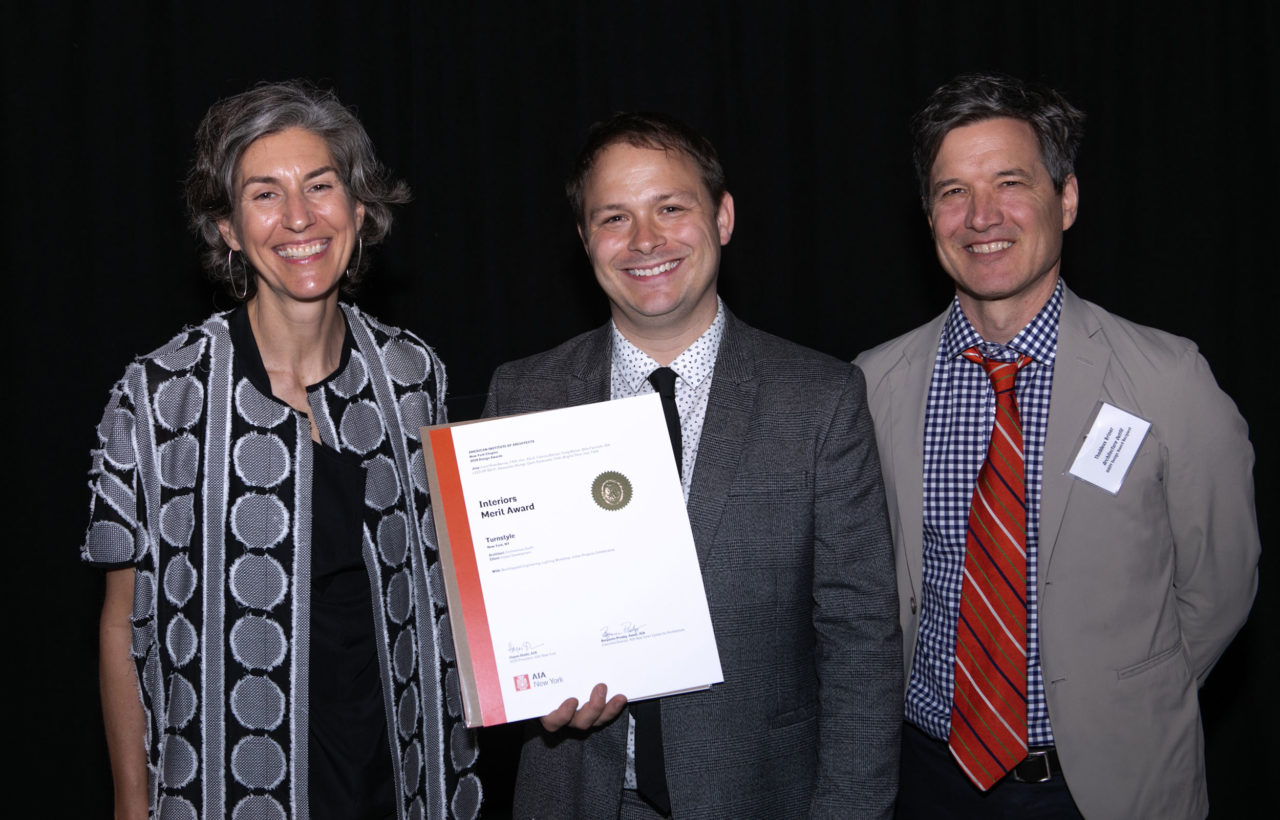 Thaddeus Briner of Architecture Outfit (right) and team accepted an Interiors Merit Award for Turnstyle in New York City. Photo: Sam Lahoz.
