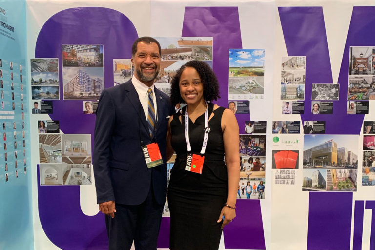 AIANY board member Pascale Sablan, FAIA, with AIA President Bill Bates, AIA, in front of the Say it Loud exhibition she curated.