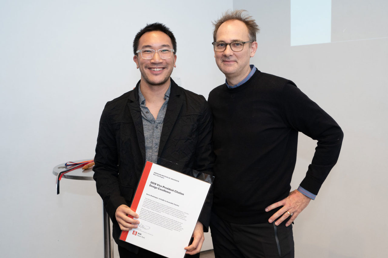Andrew Lee, co-chair of the Interiors Committee, accepts a VP Citation for Design Excellence for the Committee's program "Karen Braitmayer: A Profile in Accessible Practice" from Dan Wood, AIA, VP of Design Excellence on the Board. Photo: Samuel Lahoz.