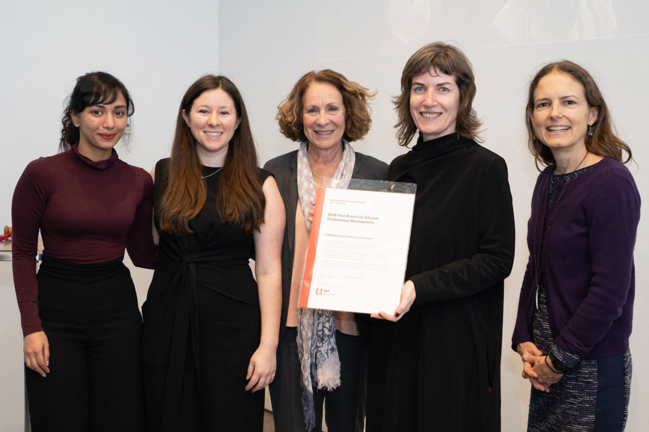 The Women in Architecture Committee accepts the VP Citation for Professional Development from Andrea Lamberti, AIA, Vice President for Professional Development. Photo: Samuel Lahoz.