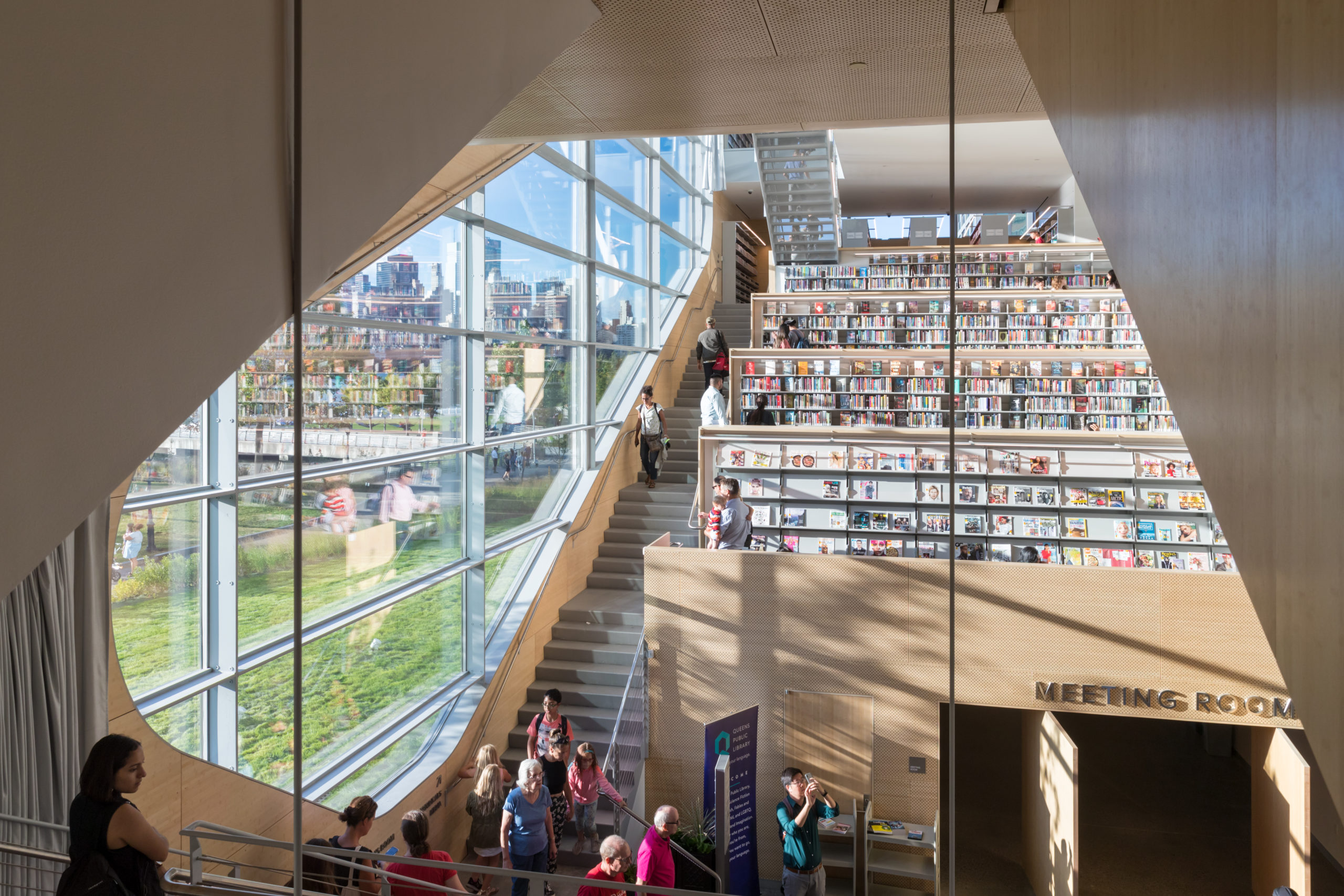re Merit Award: Hunters Point Library by Steven Holl Architects and Michael Van Valkenburgh Associates, in Long Island City, NY. Photo: Iwan Baan.