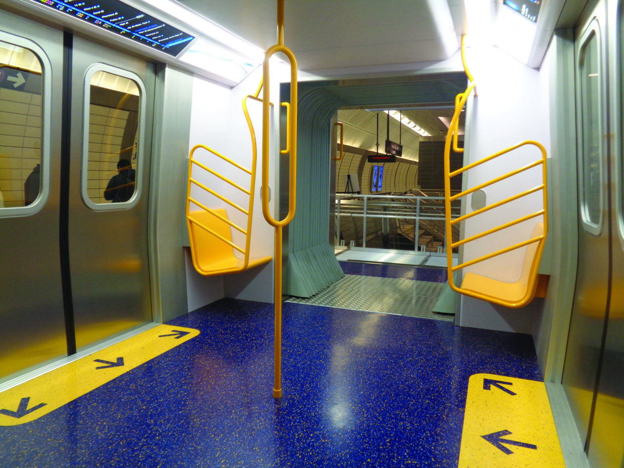 The open-gangway mockup of the R211 subway car installed in the lower mezzanine of the 34th Street—Hudson Yards subway station. Photo: Wikimedia Commons/Tdorante10.