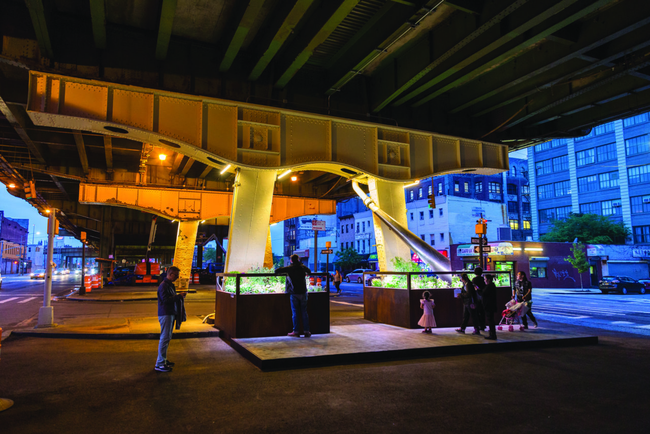 Installation of the Sunset Park El-Space Pilot at the intersection of 36th Street and Third Avenue. The initiative is a collaboration between the Design Trust for Public Space, the NYC DOT, and various community groups and organizations. Photo: NYCDOT.