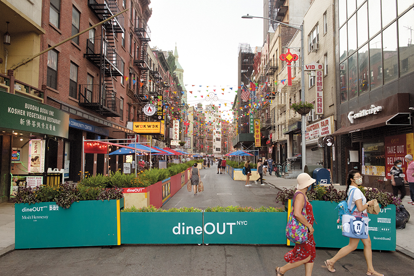 DineOut NYC, a communal-dining prototype designed pro bono by Rockwell Group, has been installed in Manhattan's Chinatown (above left) and in Elmhurst (above right), as well as in other areas of Queens and the Bronx. Photo: Courtesy of Rockwell Group.