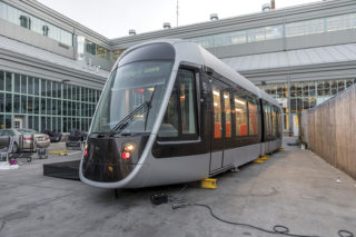In late 2017, public officials and advocates joined the Friends of the BQX to unveil a prototype of the streetcar that would run between Astoria and Sunset Park. Photo: Courtesy of Friends of the Brooklyn Queens Connector.