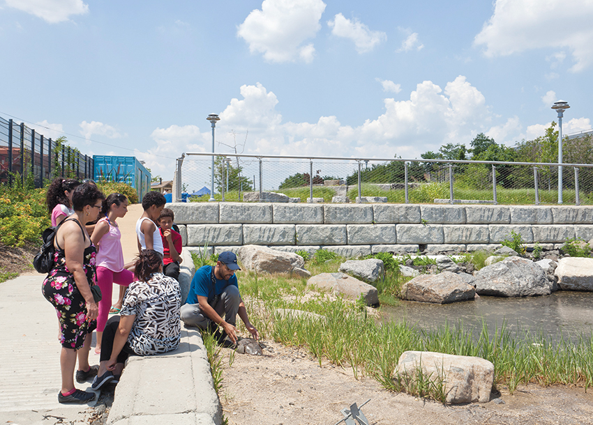 For landscape architects striving for long-term success on the shoreline, it’s just as imperative to know what type of material they’re working with as who they’re truly working for. Much like the varying communities living on the shoreline, each shoreline type and material—timber, concrete, steel, stone jointing, sand replenishment—requires a unique approach to fostering resiliency, and each has advantages and limits. For example, in the development at beachfronts like the Rockaways and Coney Island, sand can be elevated only so much before it negatively impacts inland grades. But for more urban shorelines, like the ones at Scenic Hudson Park and Hunters Point South, the angle of riprap—loose stone used to form a foundation for breakwater structures—must be changed to produce either inland or in-water impacts strategically, to avoid more permanent damage. Photo: Courtesy of MNLA.