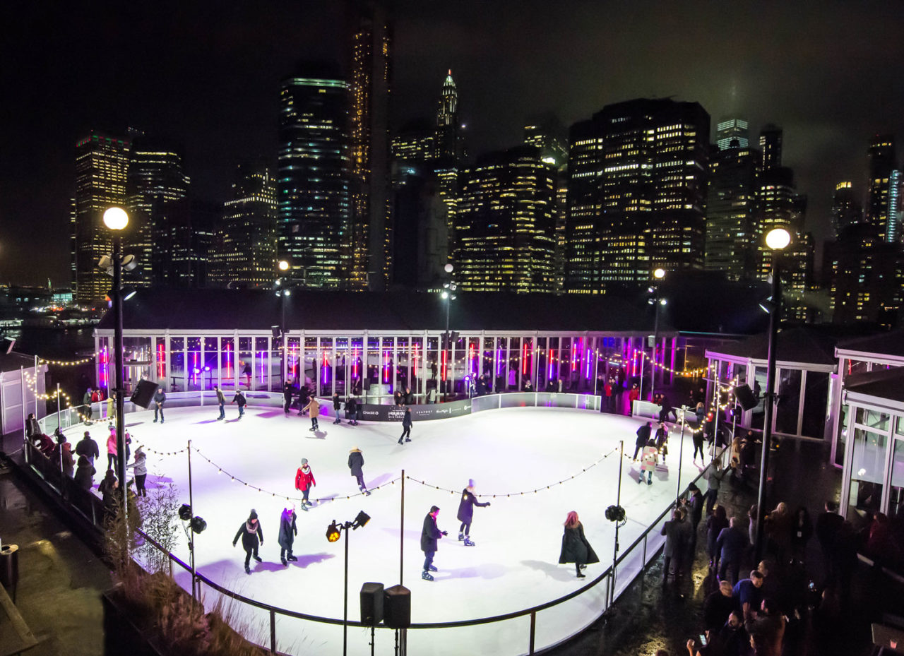Winterland Ice Skating Experience, Pier 17, New York, NY. This seasonal skating rink is one of two rooftop rinks in the U.S. With Mancini as the architect-of-record to the Rockwell Group-designed space, food pavilions and a flexible event hall flank the public skating rink. The design takes cue from water towers on neighboring rooftops. Credit: Courtesy of the Howard Hughes Corporation.