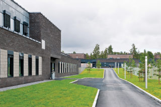 An internal roadway between two buildings on the campus of the maximum-security Halden Prison in Norway, designed by ERIK Arkitekter. Photo: Courtesy of ERIK Arkitekter.