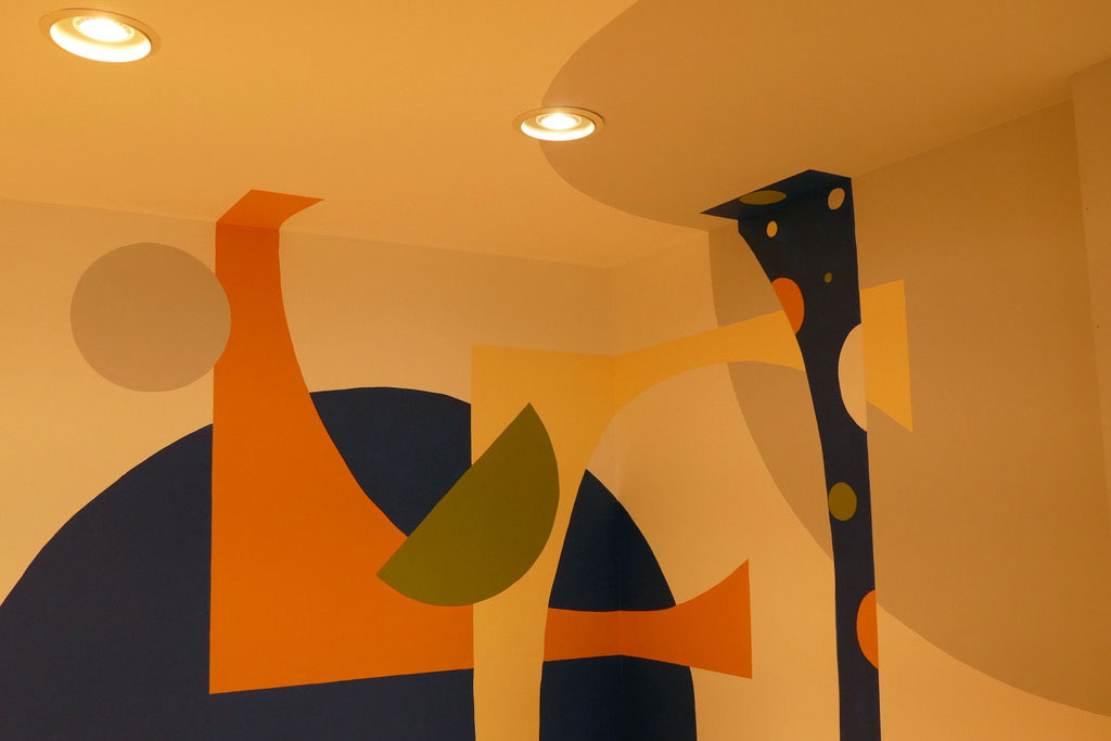 A closeup of the painted wall mural at the library that Ennead Architects and Richter+Ratner are renovating for Concrete Safaris.