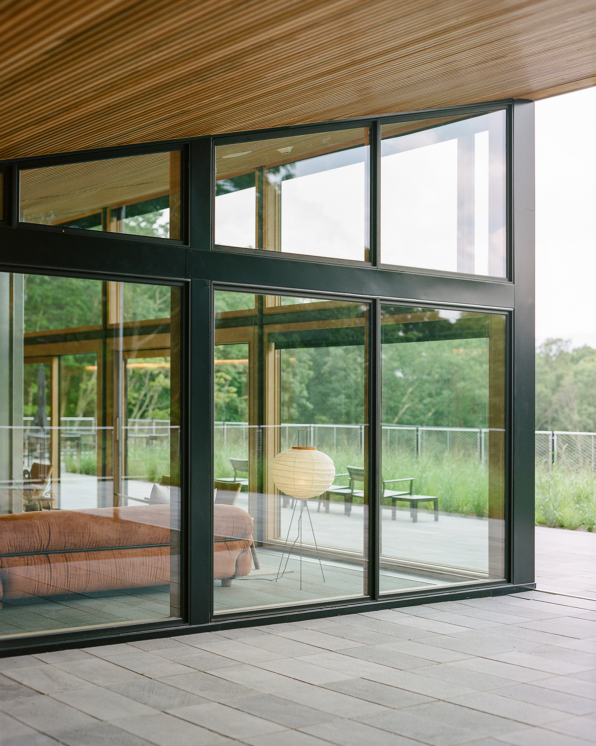 A photograph of the glazing of one of the Piaule Catskills cabins.