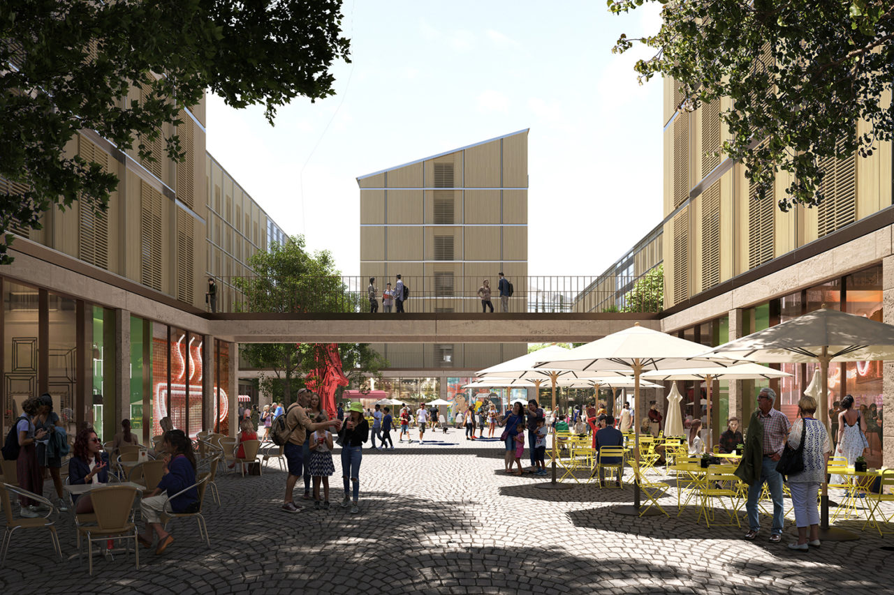 A rendering of the Olympic Village, showing vibrant businesses and a building in the background.