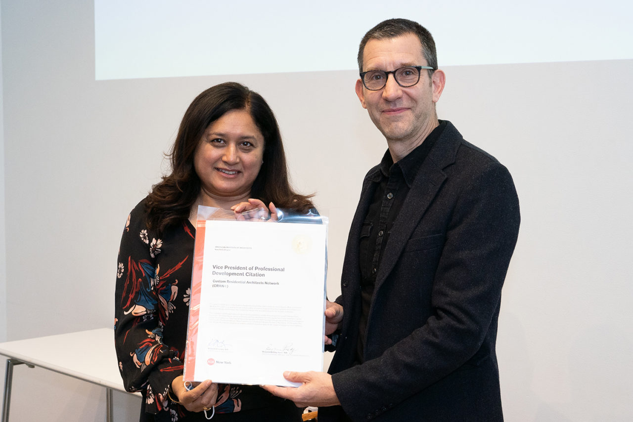 Photo of co-chair Namita Modi accepting Vice-Presidential Citation for Professional Development.