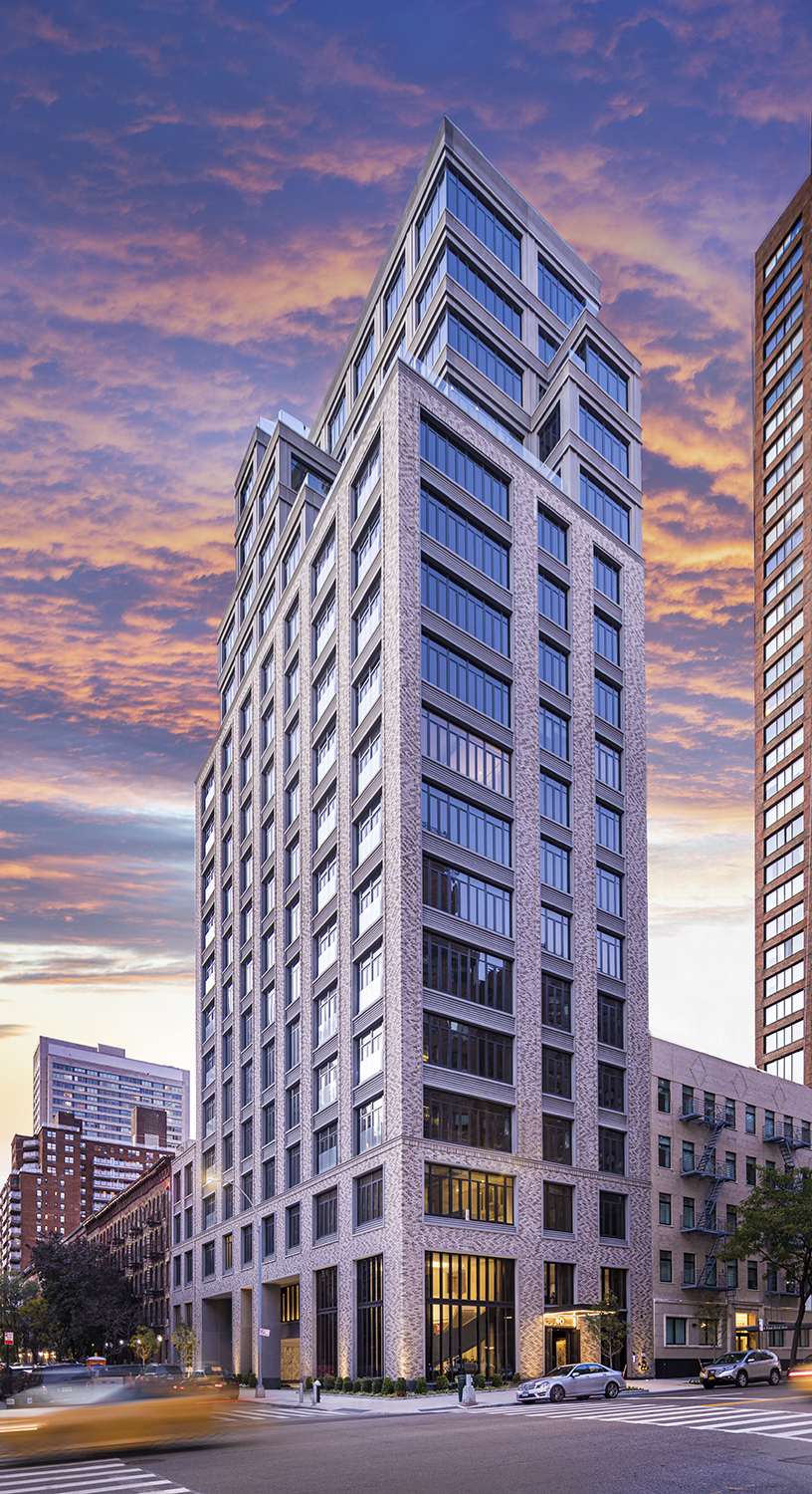 Photo of the exterior of 40 East End at dusk.