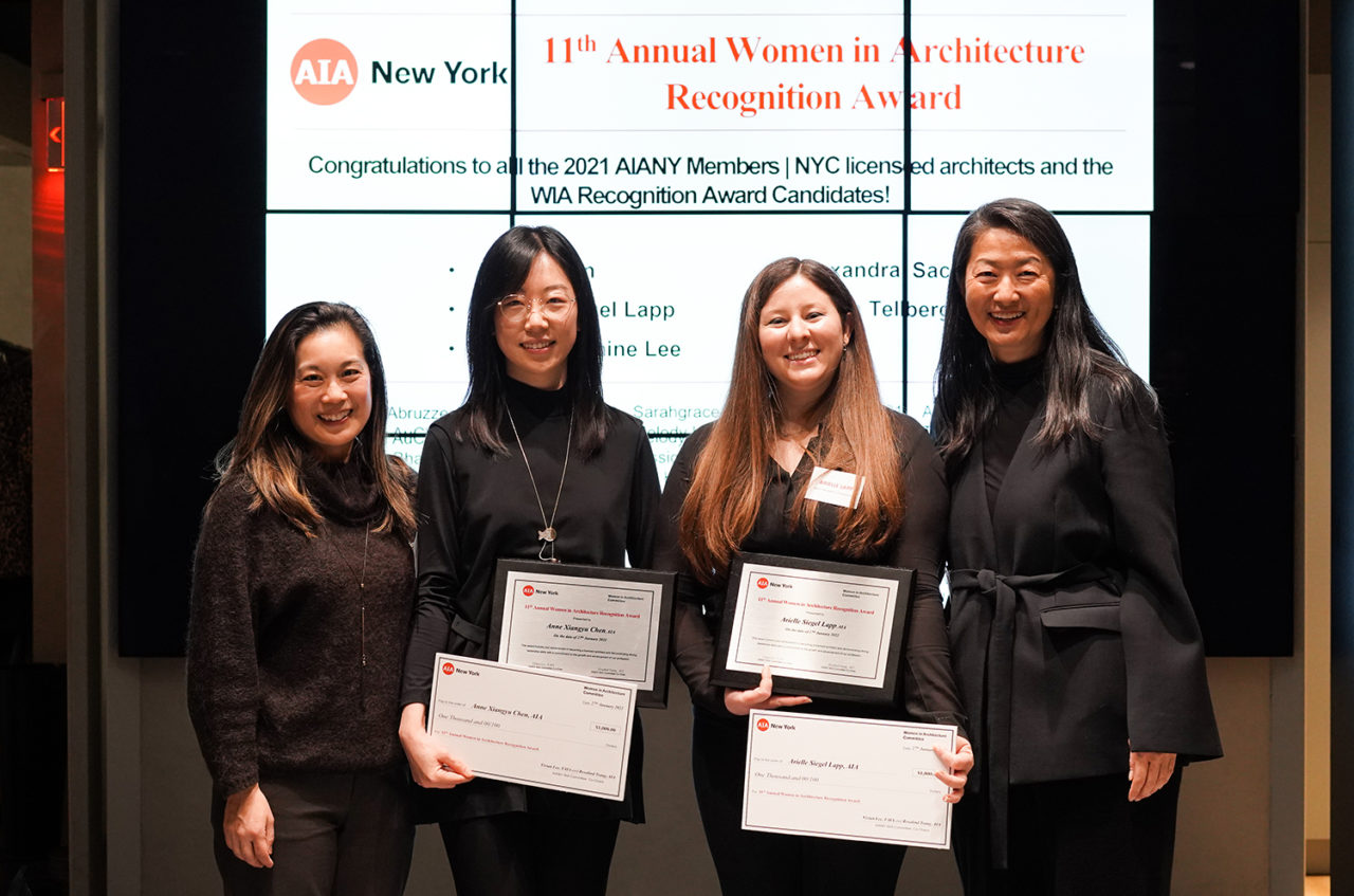 Anne Xiangyu Chen and Arielle Siegel Lapp holding their award certificates at the award ceremony..