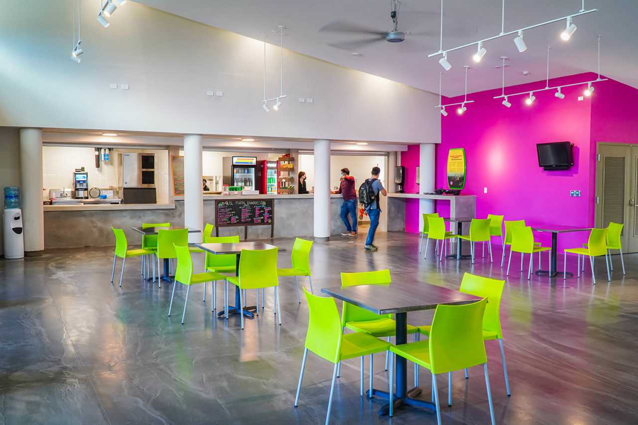 The interior of El Portal Visitor's Center, featuring bright green chairs.