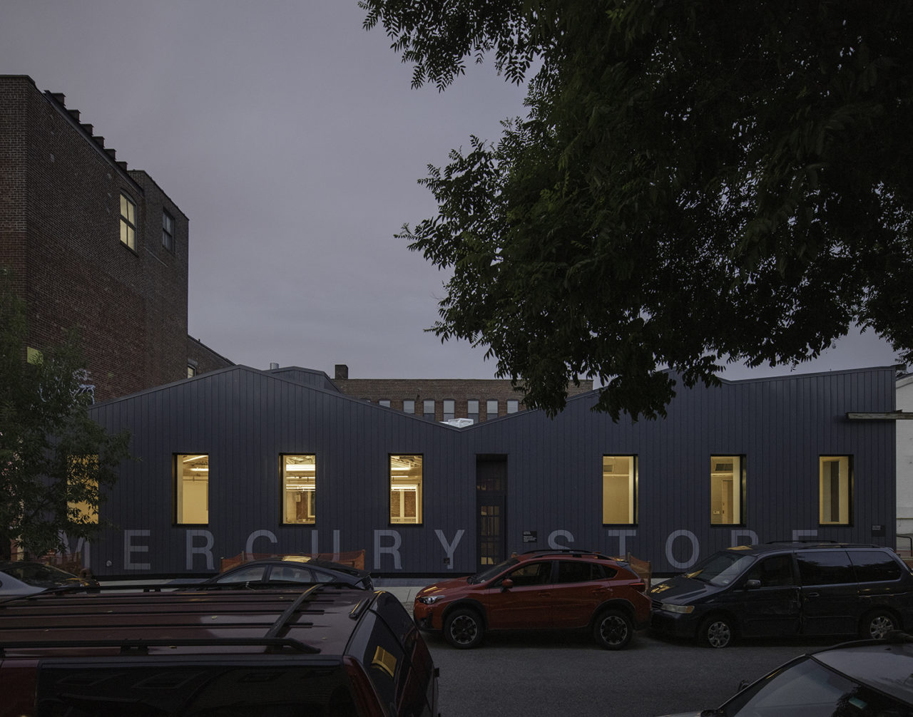 The exterior of the Mercury Store at dusk.