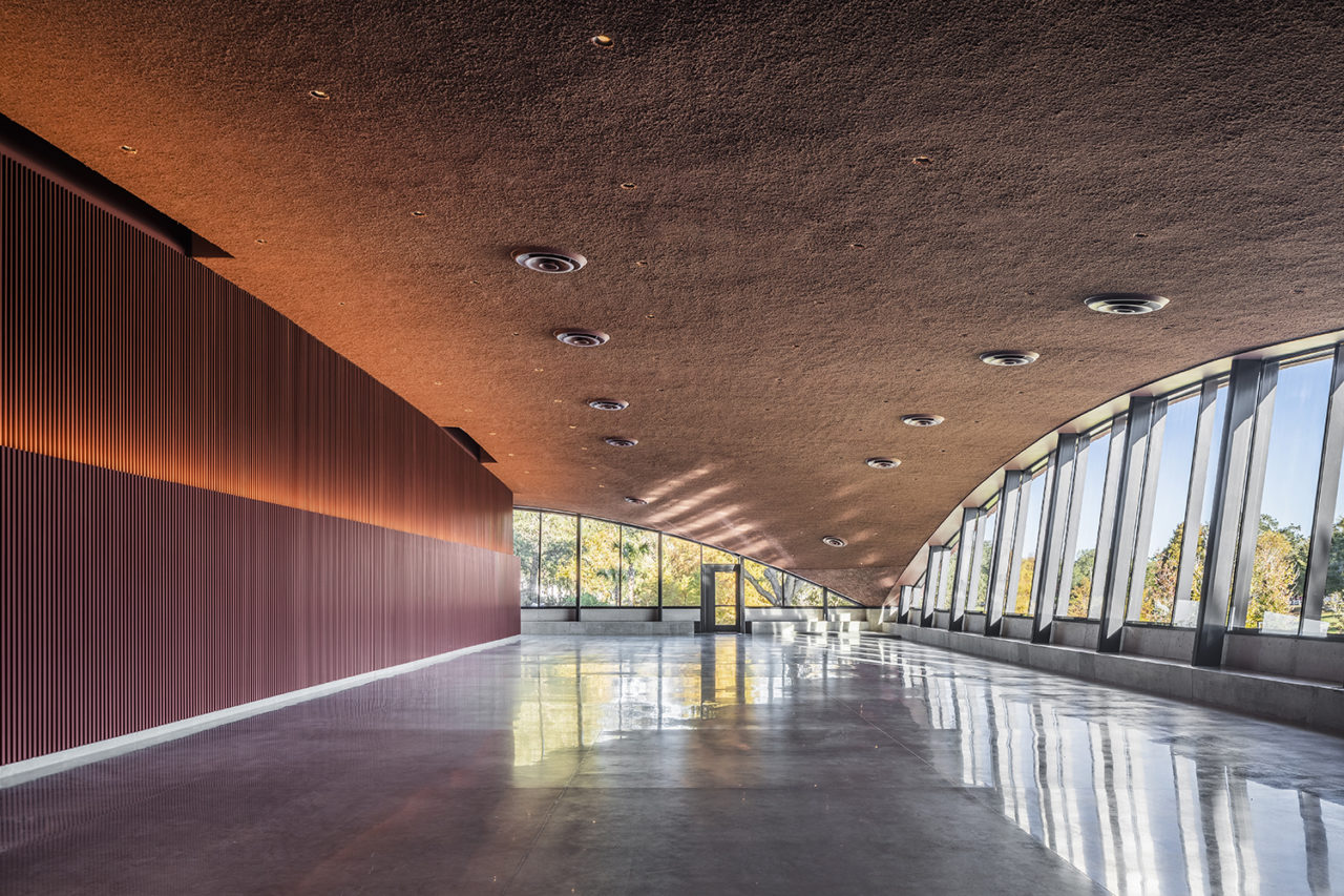 Interior space at Winter Park Library and Events Center, featuring rose-pigmented concrete vaults.