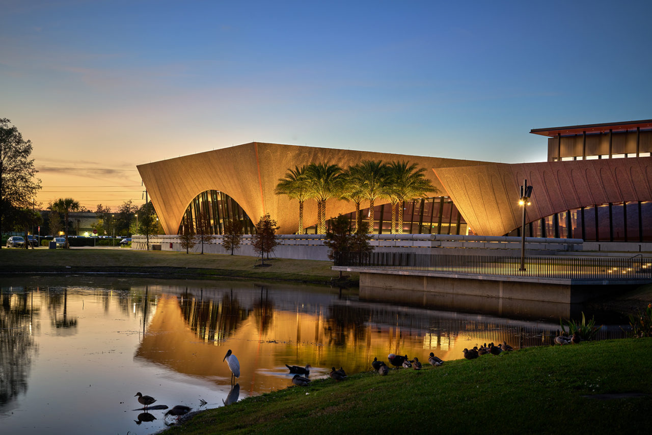 The exterior of Winter Park Library and Events Center at dusk.