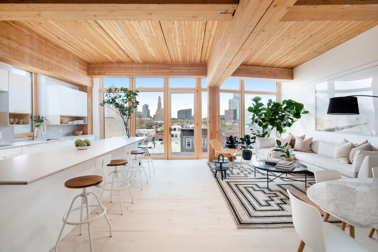 Residential interior with timber beams and ceilings.