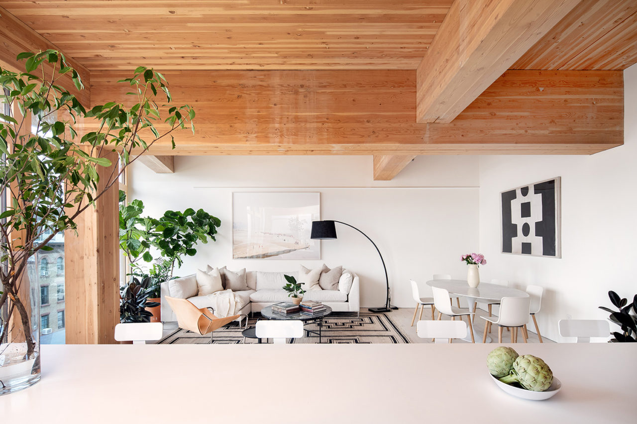Residential interior with timber beams and ceilings.