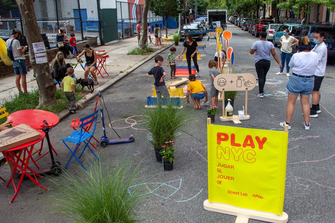 Children play on a pedestrianized street