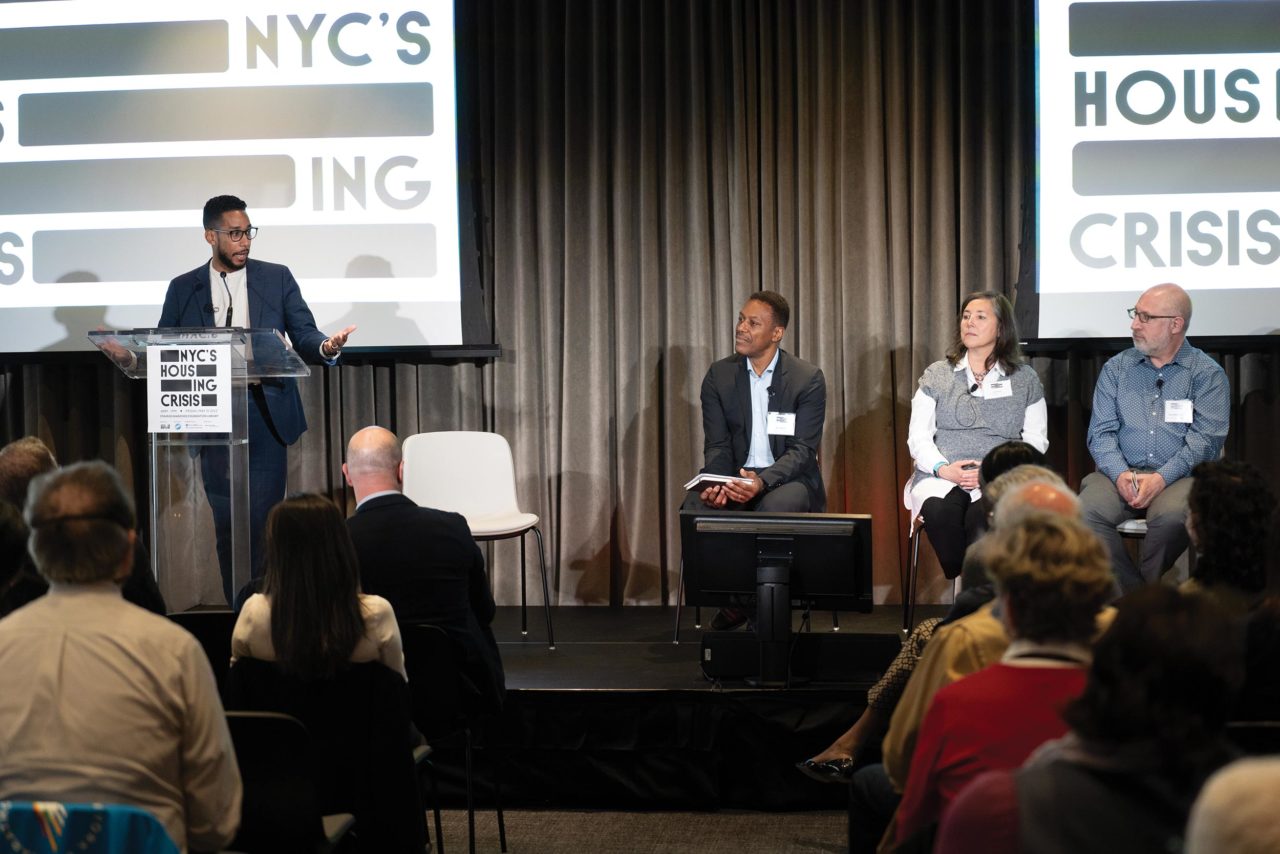 Brooklyn Borough President Antonio Reynoso addresses the crowd before a discussion with, left to right: Marc Norman, Associate Dean of the NYU Schack Institute of Real Estate; Lisa Gomez, CEO of L+M Development Partners; and Muzzy Rosenblatt, CEO and President of the Bowery Residents’ Committee.
