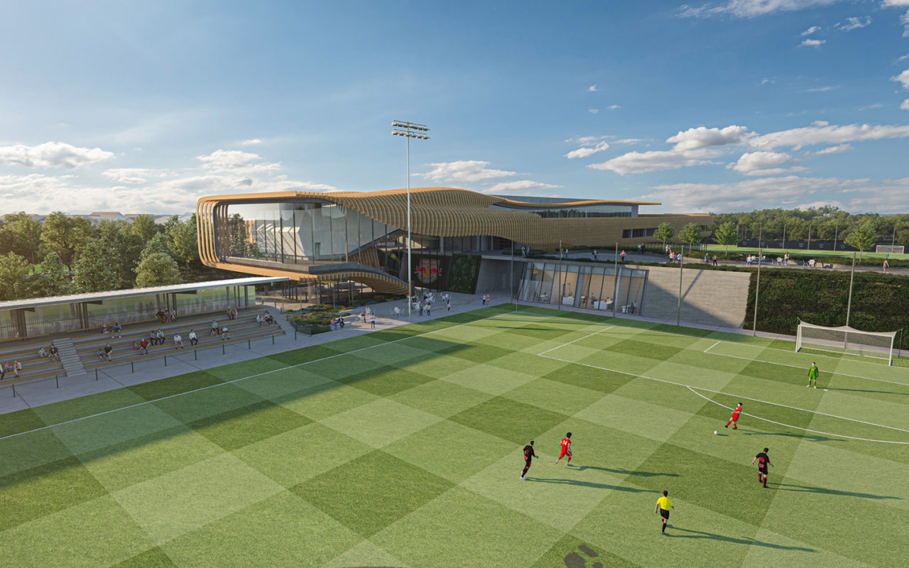 Rendering of Red Bulls training facility soccer fields with campus building in the background
