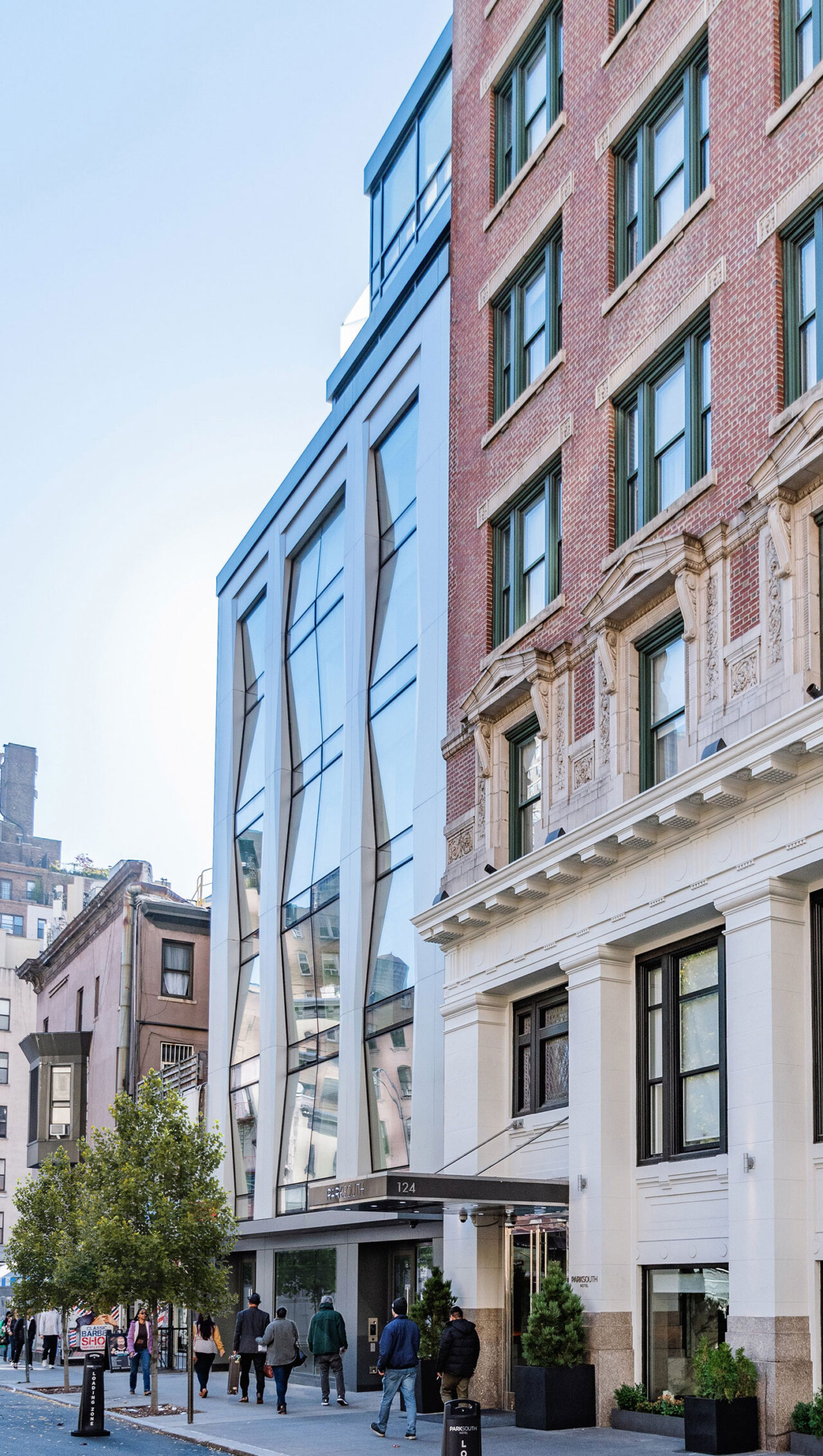 Exterior facade of 128E28 and the buildings alongside it