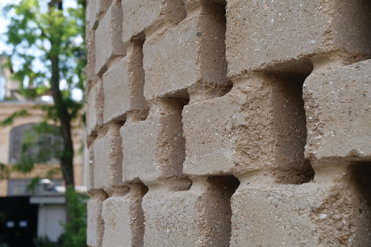 Compressed earth blocks, created from soil excavated during the railway expansion system in Paris, were used in the Raw Earth Sgraffito installation at Columbia’s Reid Hall in Paris, created in collaboration with Lynnette Widder.
