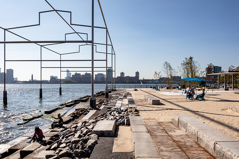 Gansevoort Peninsula: rocks and sand alongside the Hudson River