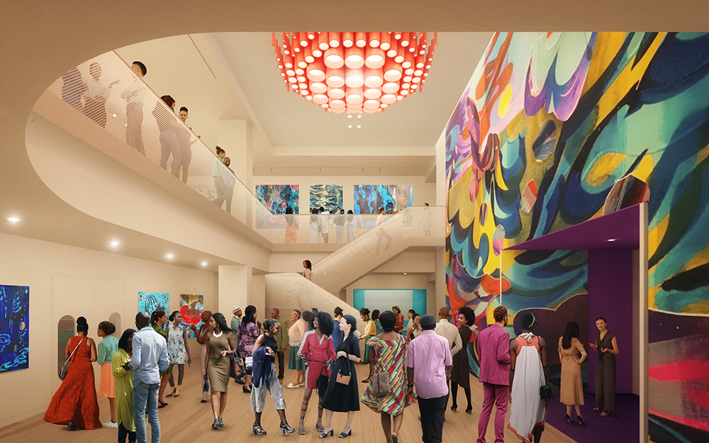 Inside of the People's Theatre. Bright and colorfully lit, buzzing with people.