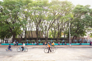 Kids ride their bikes at the Refreshing Water site in the Bronx, NY.