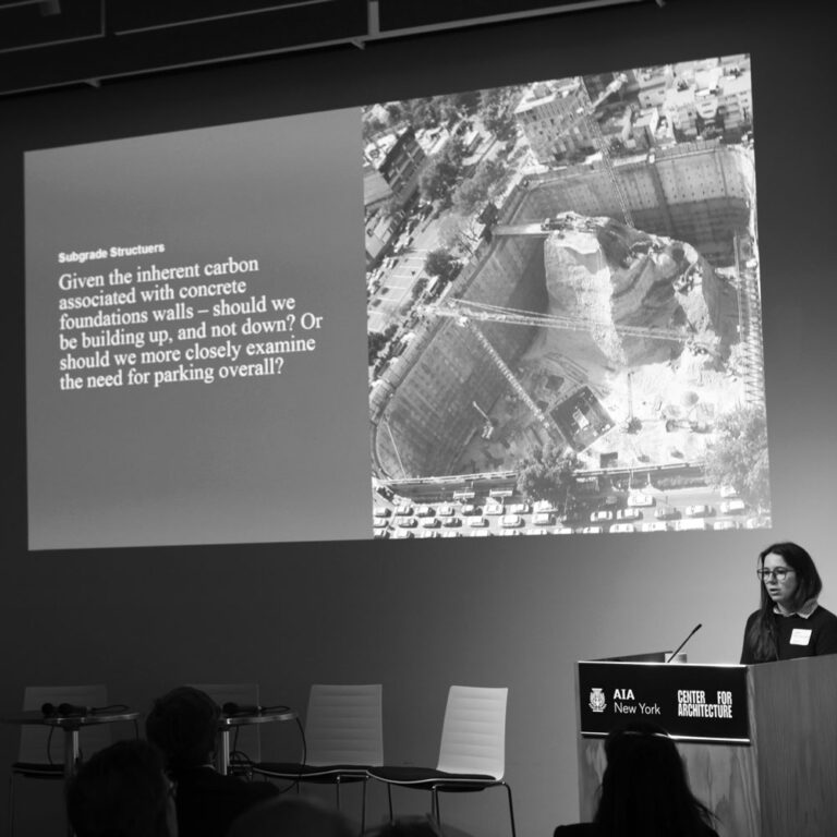 Guest speaker at the podium of a Building Science Committee event