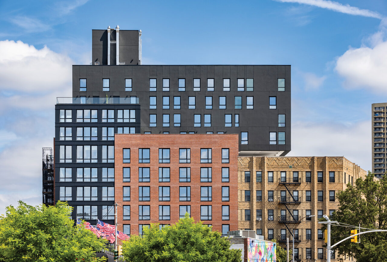 Photo of One Sullivan, a large affordable housing complex.