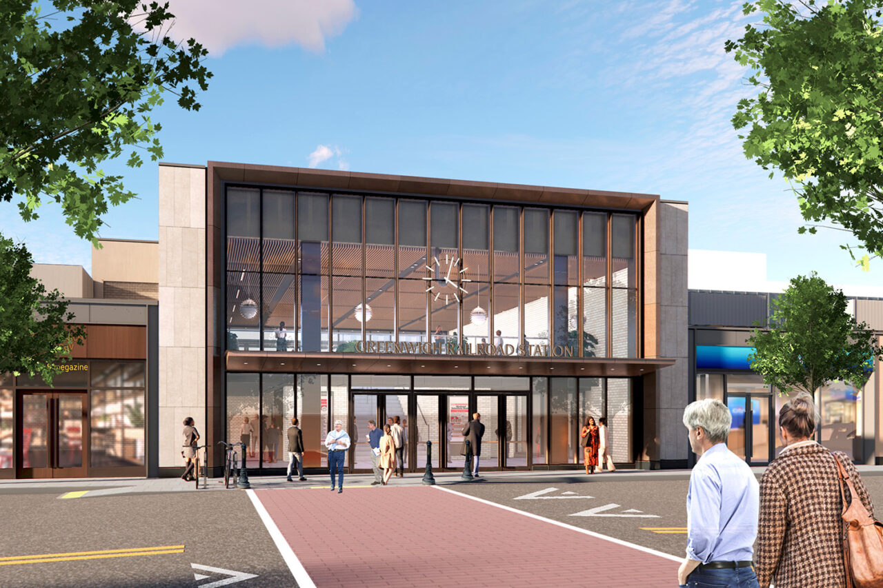 A rendering of the entrance to Greenwich Crossing, featuring large glass windows.