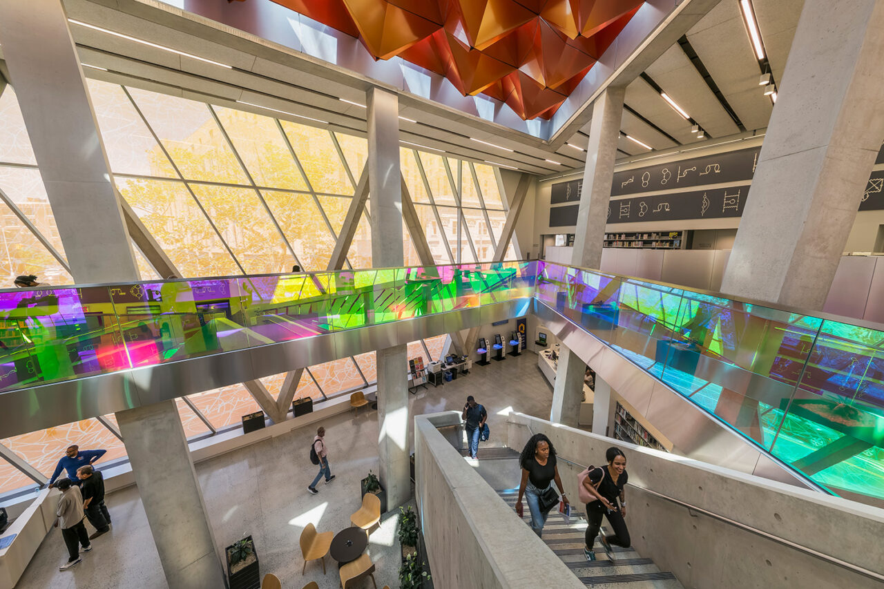Interior shot of the central atrium with dichroic glass and large windows.