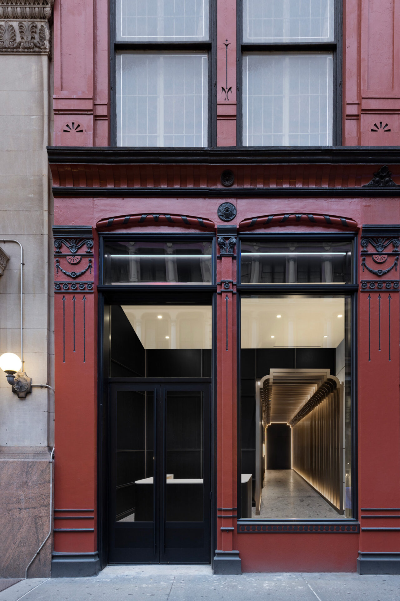 Exterior dark red brick facade