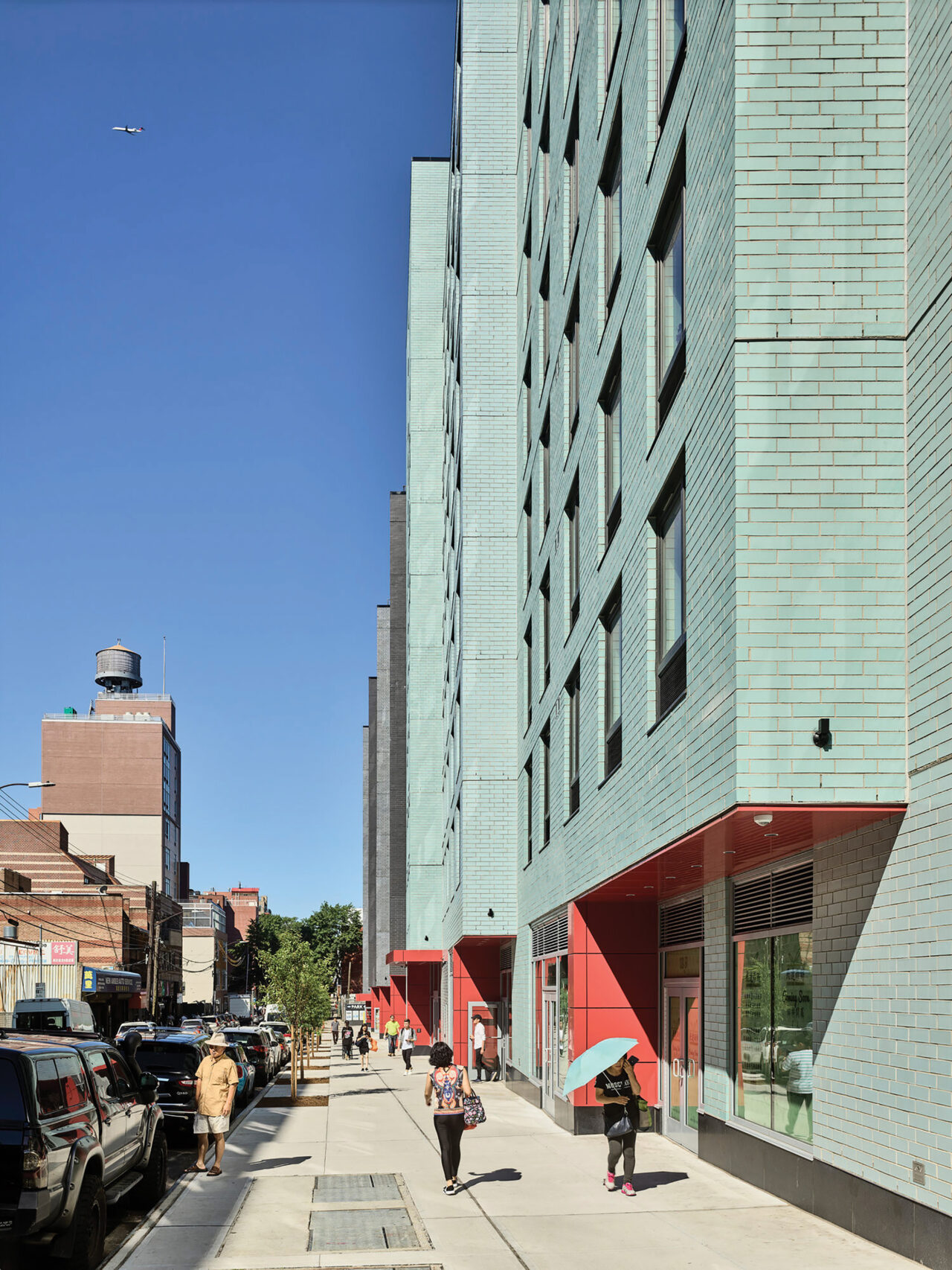 OneFlushing, designed by Bernheimer Architecture, is a 230-unit intergenerational and all-affordable housing development in Queens, NY. The project includes a 6,000-square-foot community center, providing both adult day care and social-service needs for the neighborhood, and 29,000 square feet of mixed retail space.