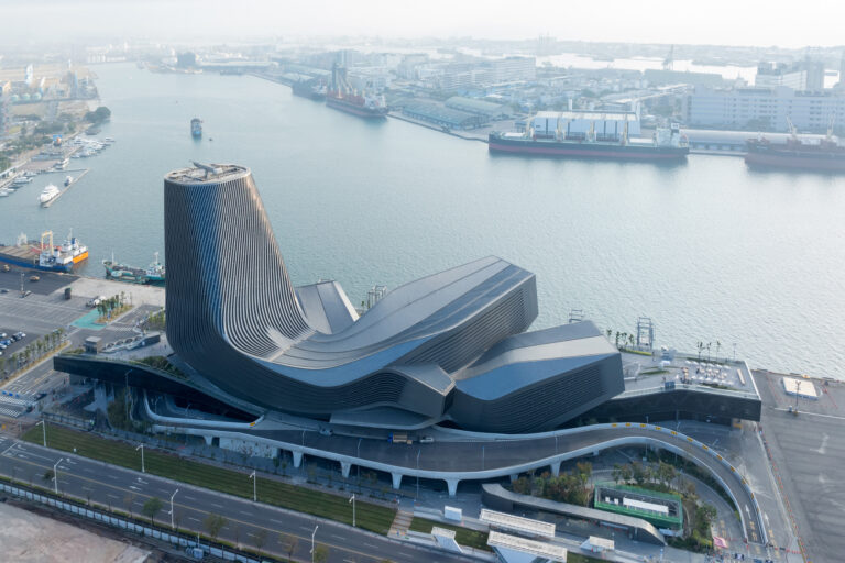 Aerial shot of Kaohsiung Port Terminal by the water.