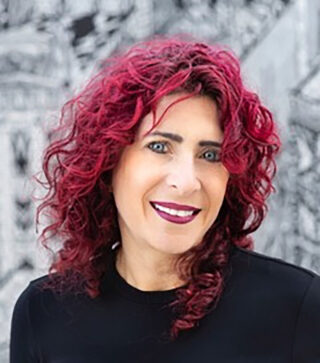 Headshot of Tami Hausman