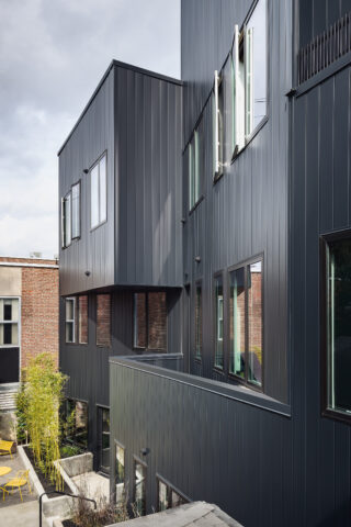 Exterior black panelling of Allen Apartments.