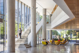 Interior shot of ground floor plaza and staircase.