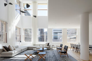 Cast Iron House wide open white space interior.