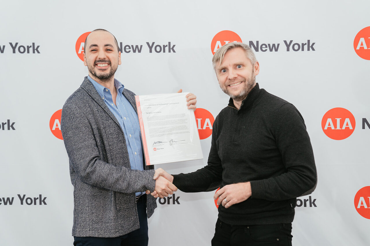 Peter Miller, AIA, LEED AP, (right) honors the Design Sprint Series, an initiative of the AIANY Emerging New York Architects Committee and the Cross-Learning Alliance, with a VP Citation for Professional Development accepted by Committee Co-Chair Burak Unel, AIA, NCARB
