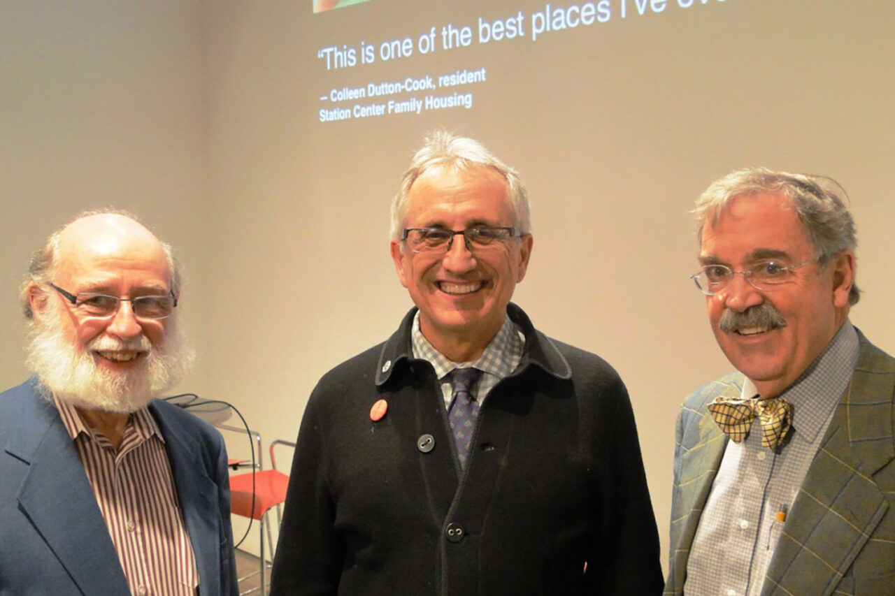 Photo of three older white men in the Tafel space at the Center for Architecture.
