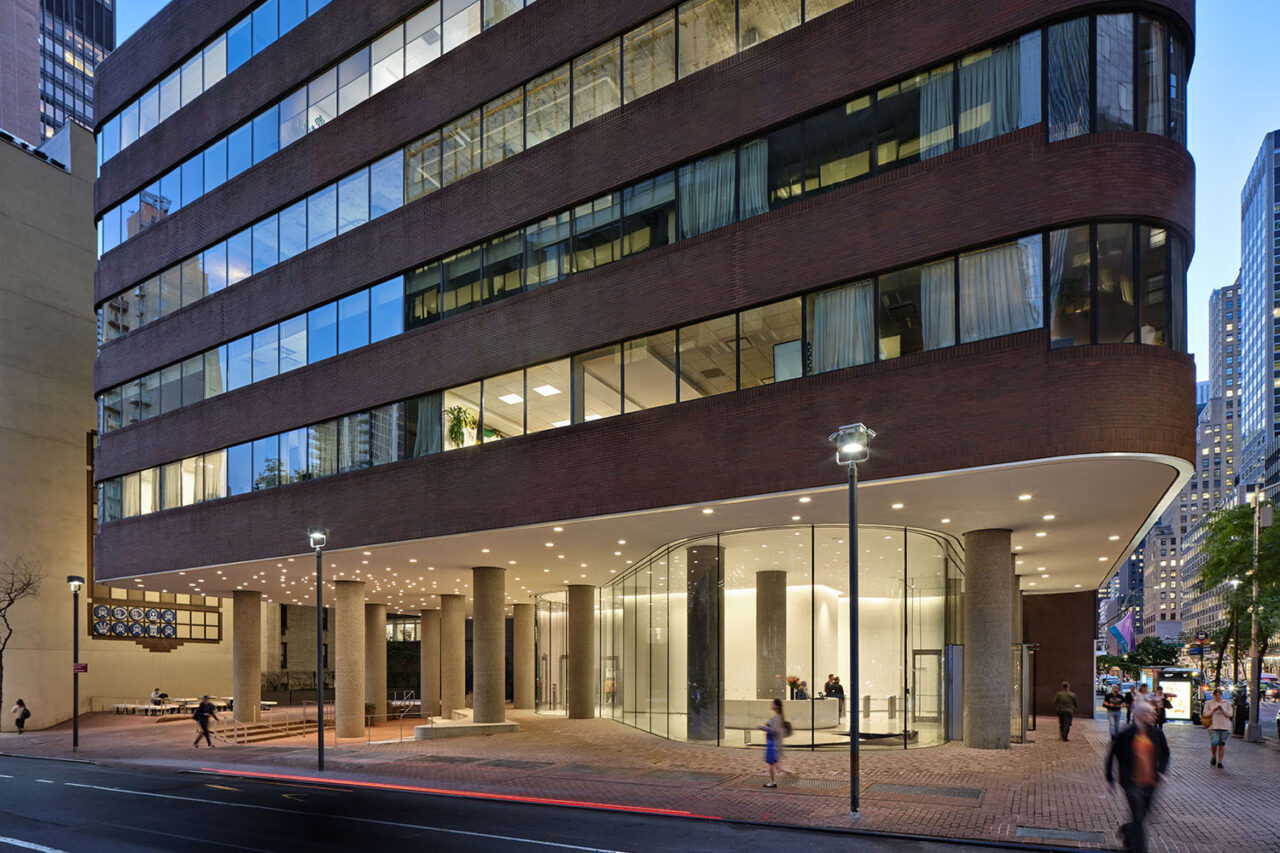 Exterior shot of building's entryway and lower levels.