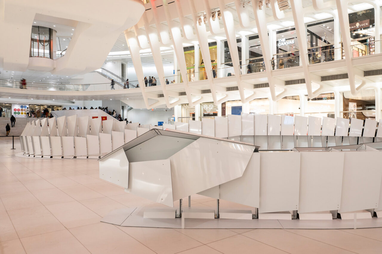 The head of the white aluminum snake installation.