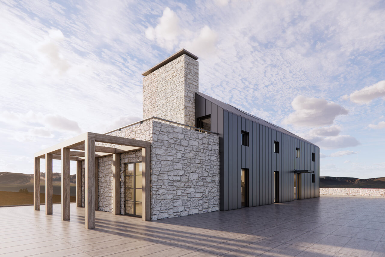 Exterior shot of a stone and metal-clad grey structure.